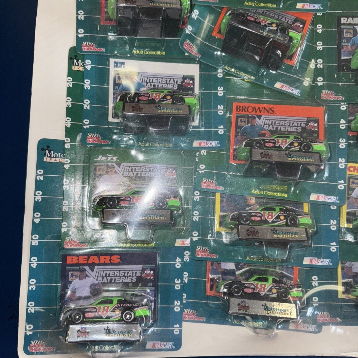 1992 NFL NASCAR Racing Champions Set – 28 Cars Shrink-Wrapped on Display Board