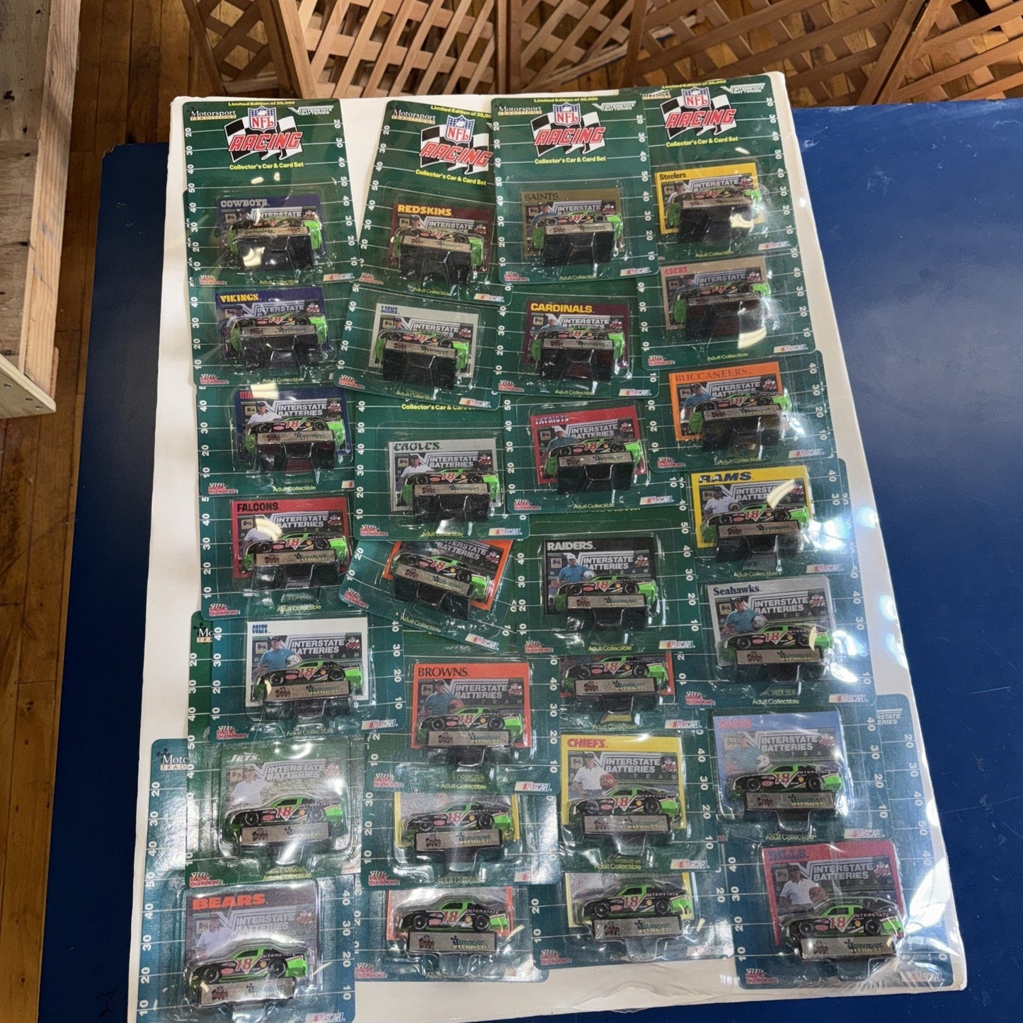 1992 NFL NASCAR Racing Champions Set – 28 Cars Shrink-Wrapped on Display Board