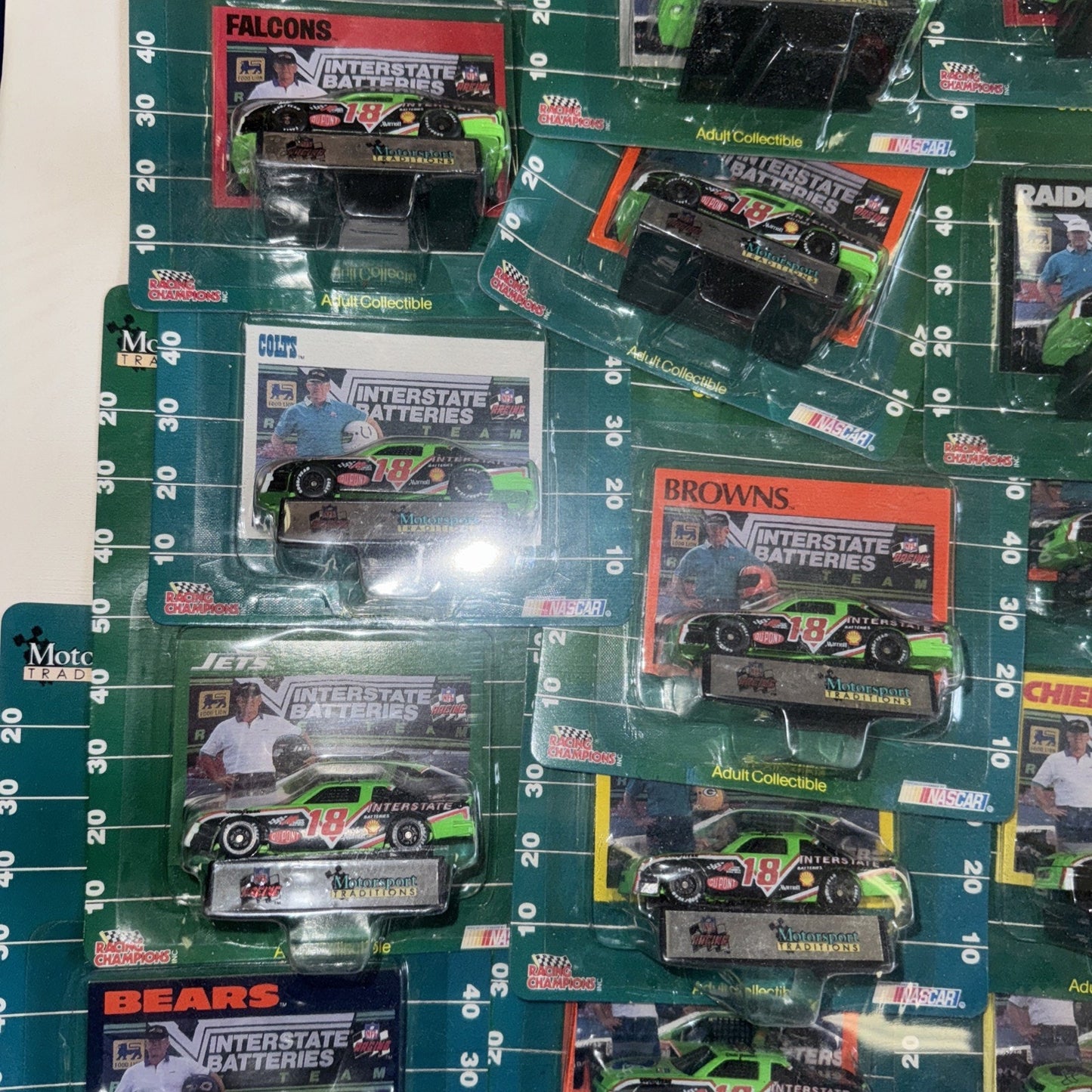 1992 NFL NASCAR Racing Champions Set – 28 Cars Shrink-Wrapped on Display Board
