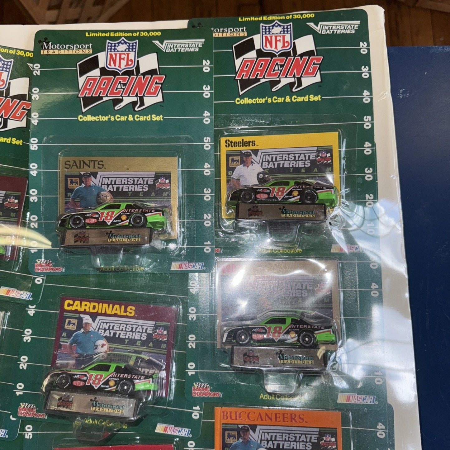 1992 NFL NASCAR Racing Champions Set – 28 Cars Shrink-Wrapped on Display Board