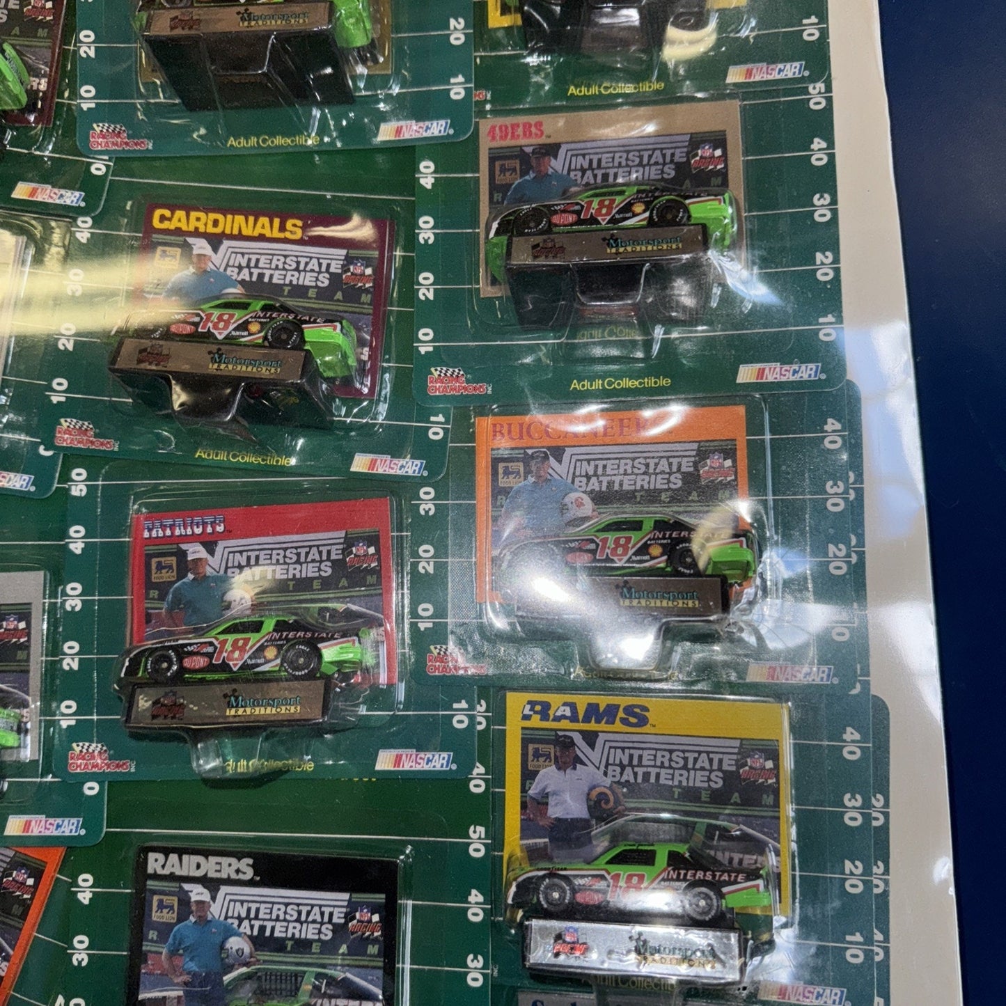 1992 NFL NASCAR Racing Champions Set – 28 Cars Shrink-Wrapped on Display Board