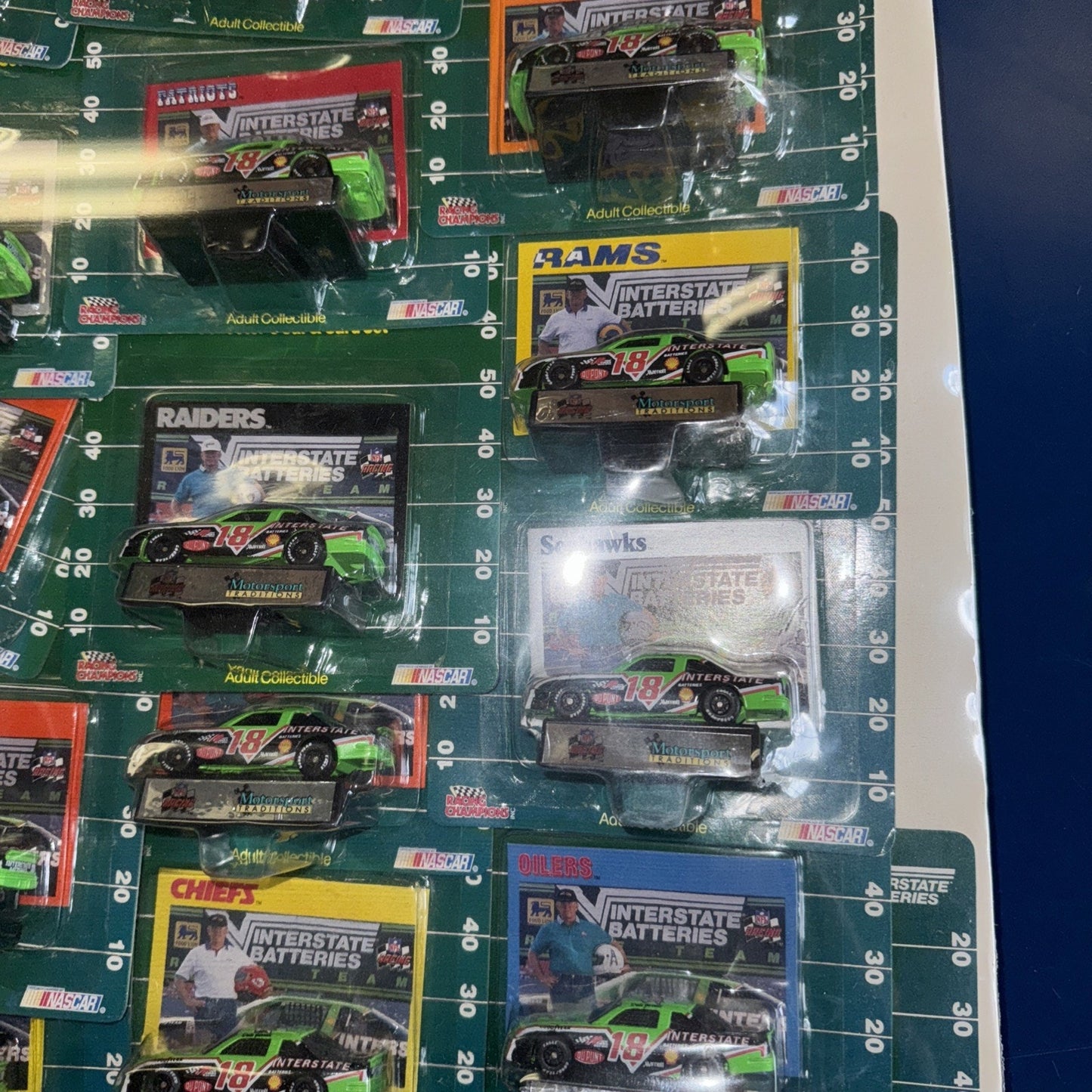 1992 NFL NASCAR Racing Champions Set – 28 Cars Shrink-Wrapped on Display Board