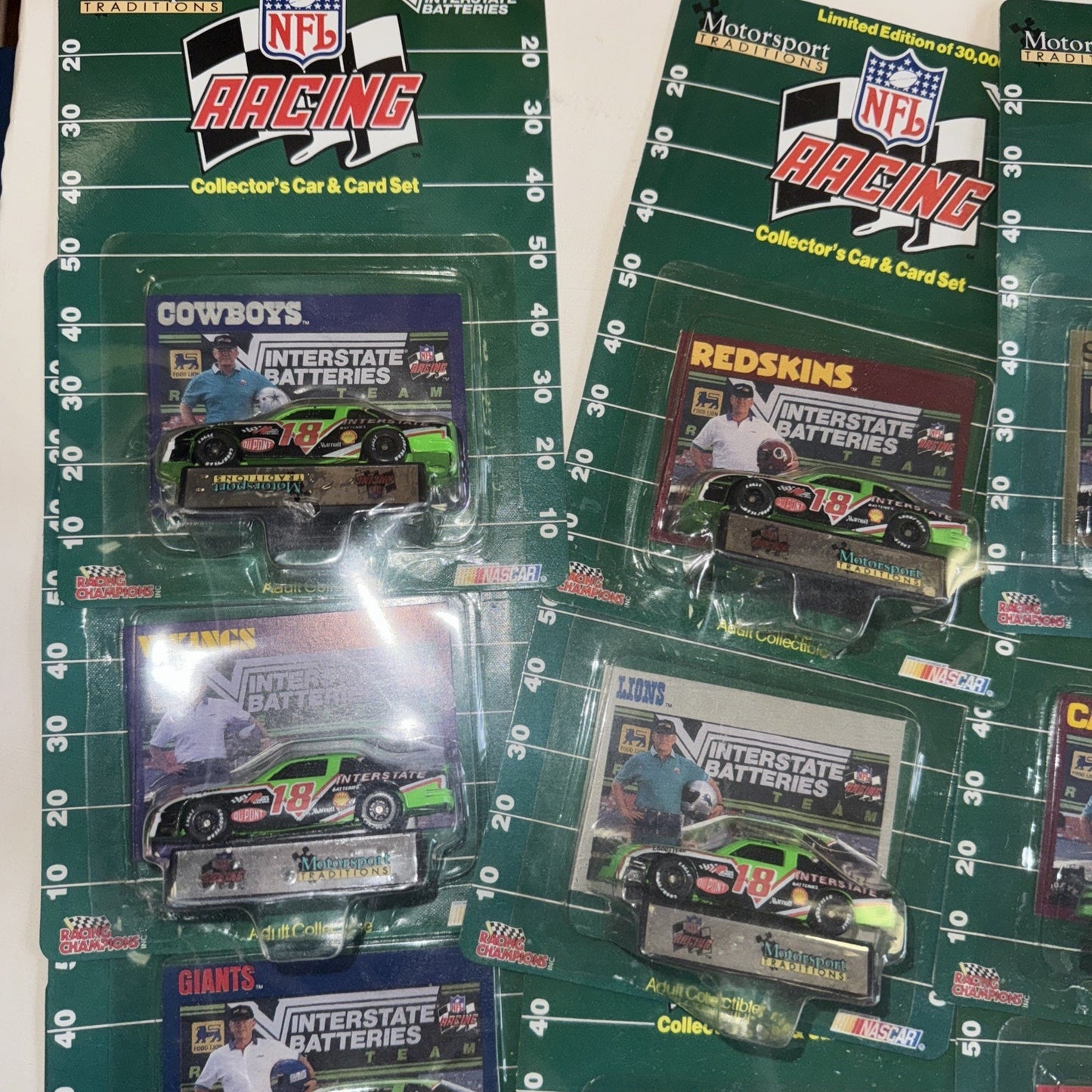 1992 NFL NASCAR Racing Champions Set – 28 Cars Shrink-Wrapped on Display Board