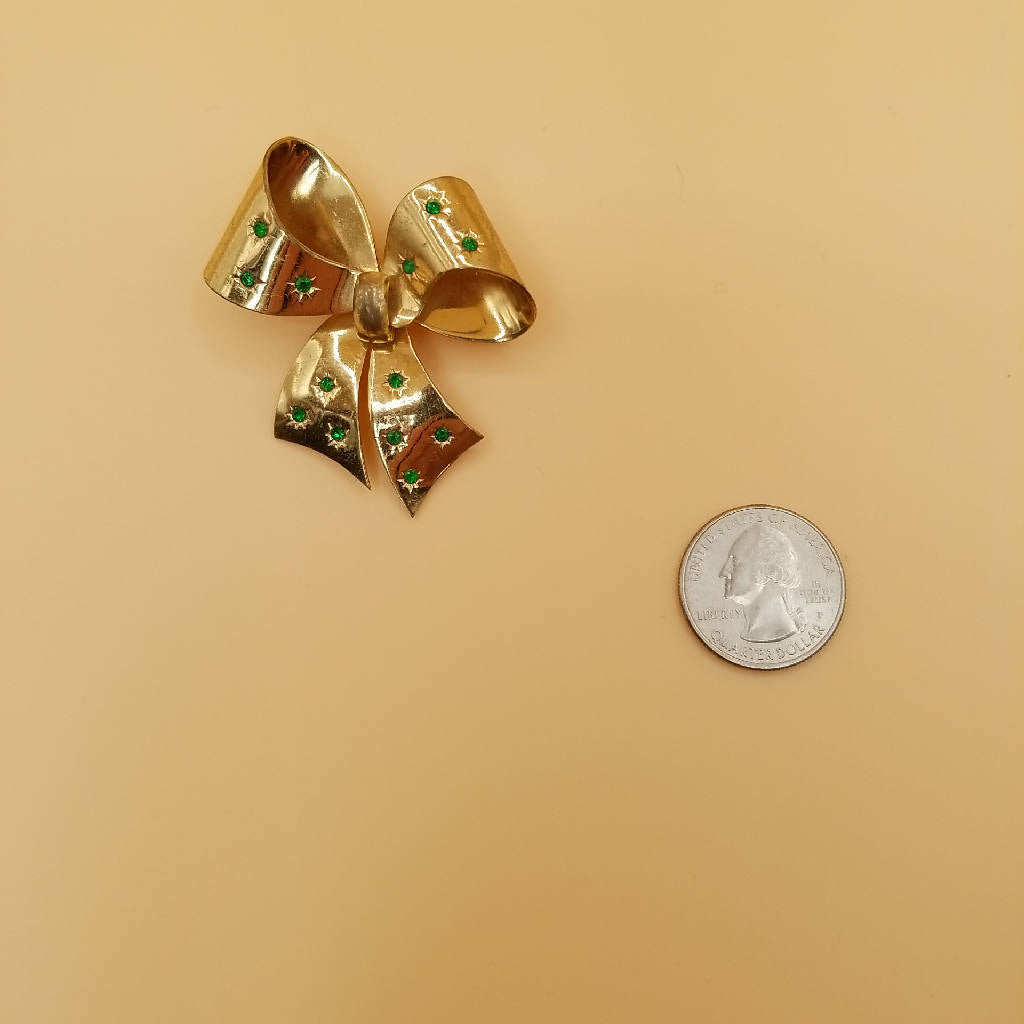 Stunning Gold Tone Bow Brooch with Green Rhinestones