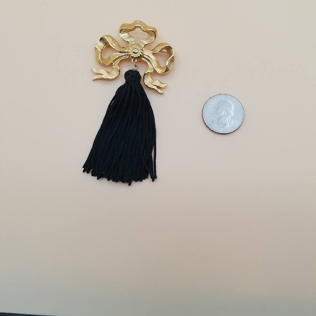 Stunning Gold Tone Bow Brooch with Black Tassel