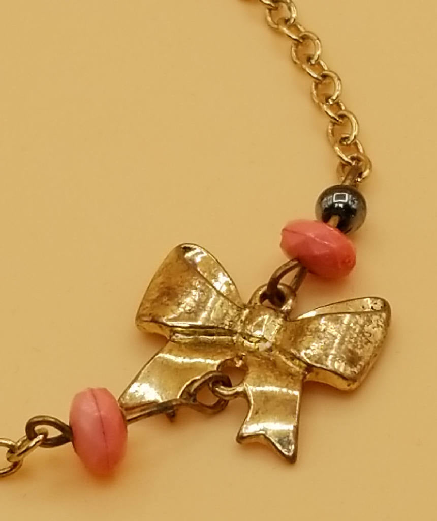 Stunning Bow Charm Bracelet with Pink Beads and Chain