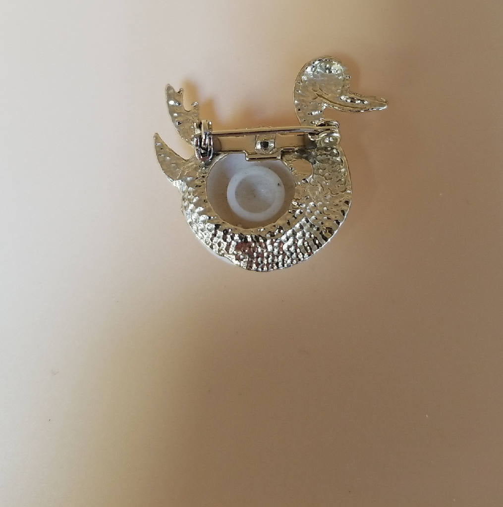 Elegant Swan Brooch with White Cabochon & Red Crystal Eye