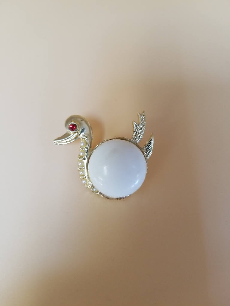 Elegant Swan Brooch with White Cabochon & Red Crystal Eye