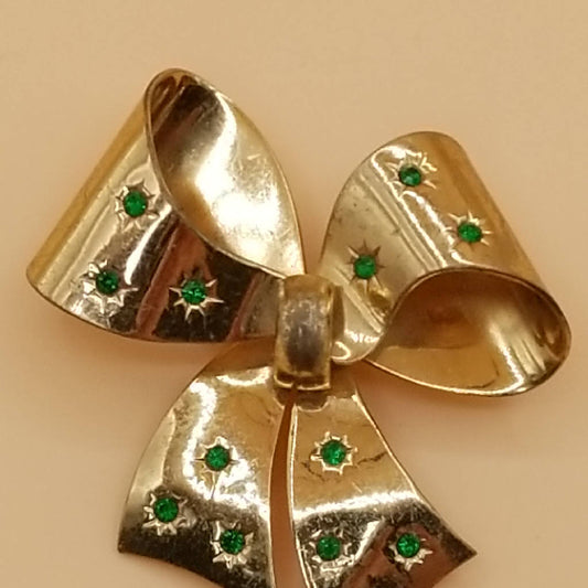 Stunning Gold Tone Bow Brooch with Green Rhinestones