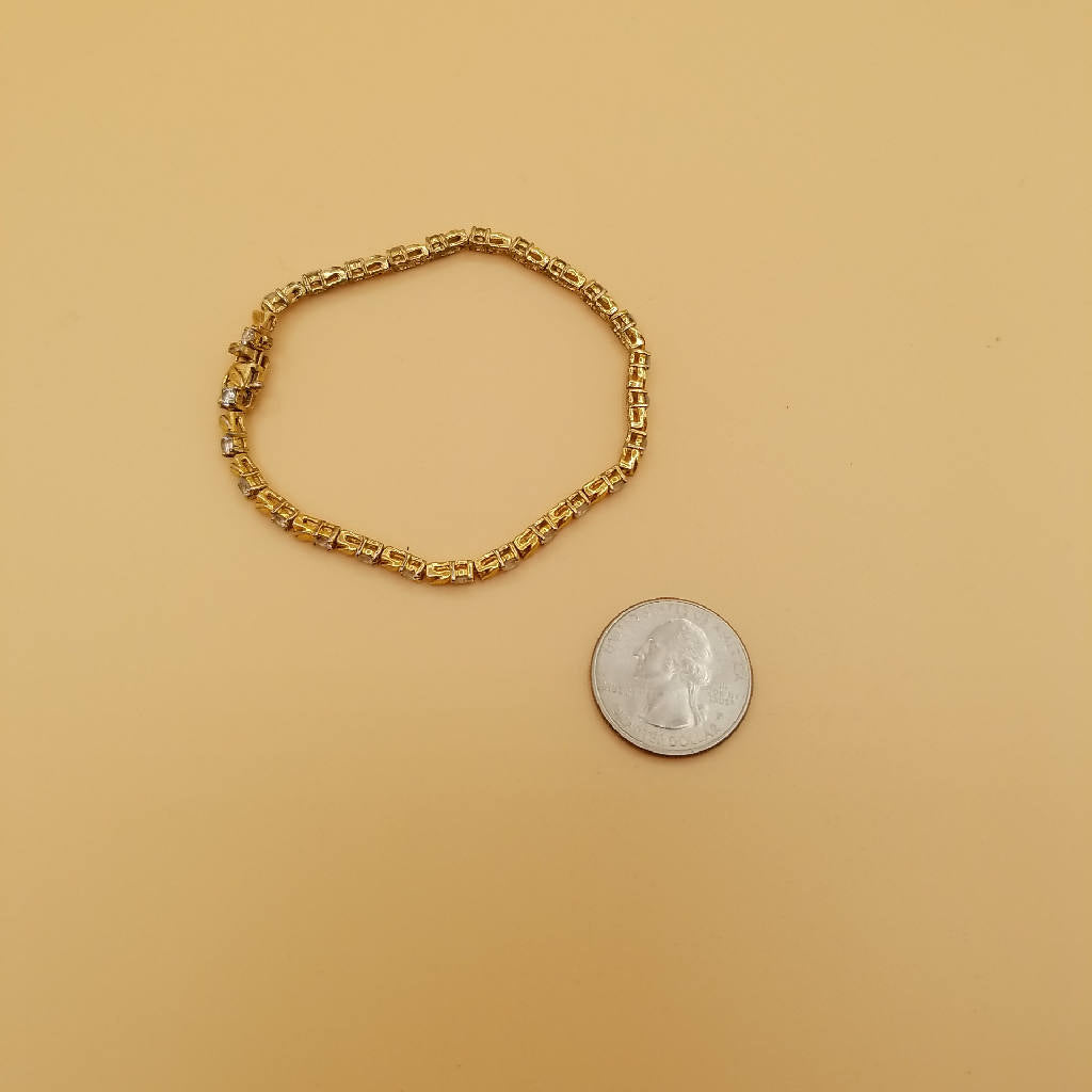 Elegant Gold-Tone Bracelet with Clear Rhinestones