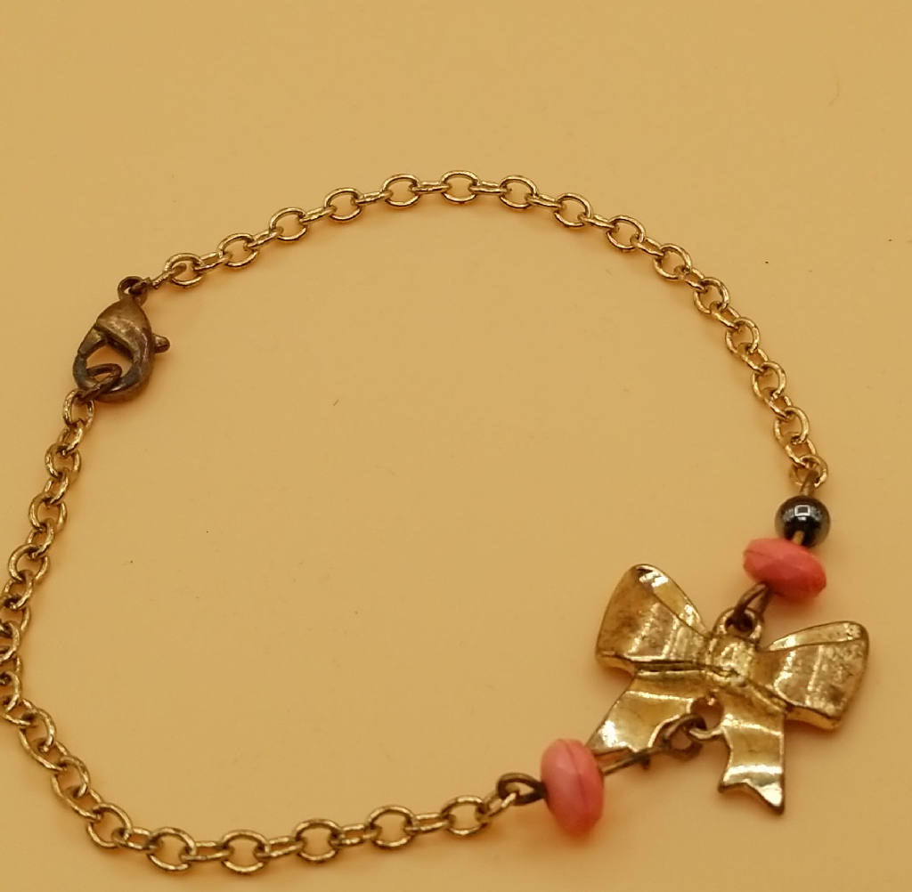 Stunning Bow Charm Bracelet with Pink Beads and Chain